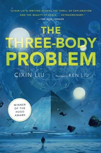 Cover of The Three-Body Problem by Cixin Liu, Tor edition, showing a lone figure on an ice plain beneath a night sky with a pyramid and distant moons